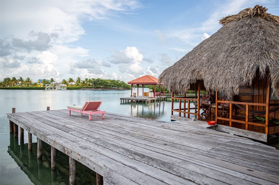 Overwater-Cabana-Thatched-Roof-Bungalows-St.-Georges-Caye-Resort-Belize---Lagoon
